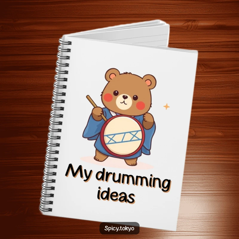 Funny cute bear in a blue kimono energetically playing a taiko drum, a cool and funny notebook.