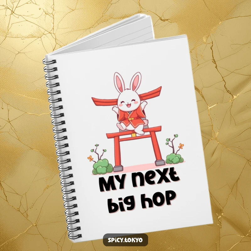 Funny bunny in a red kimono joyfully leaping over a stylized torii gate, a cute and funny notebook.
